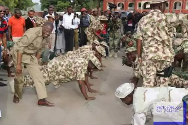 Photos: Lai Mohammed Does Push-ups With Soldiers At Their Camp In Maiduguri